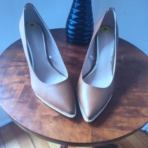 BCBGENERATION pointed toe cognac stiletto pump with chain detail on sole